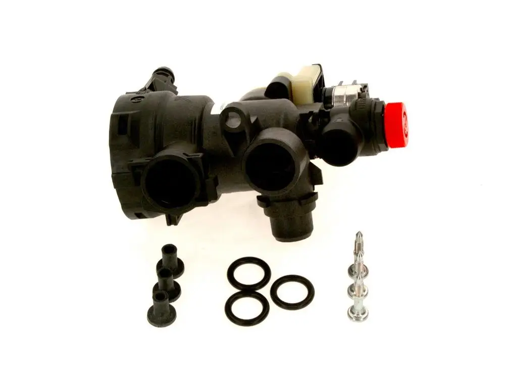 Bosch Hydraulikschalter mit mehreren Anschlussöffnungen und Zubehörteilen wie Dichtungen und Schrauben, auf weißem Hintergrund.